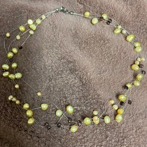 Genuine floating pearl necklace